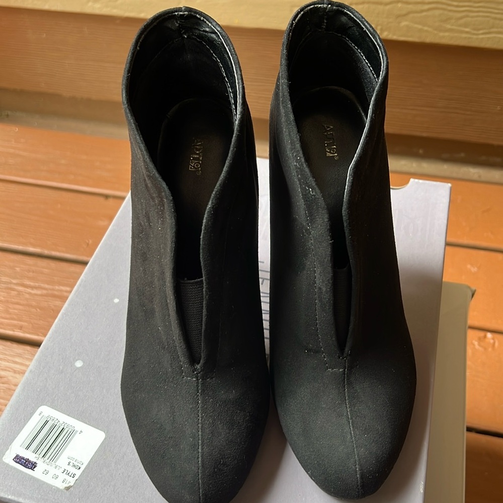 These boots are in fair condition. They are black suede material.